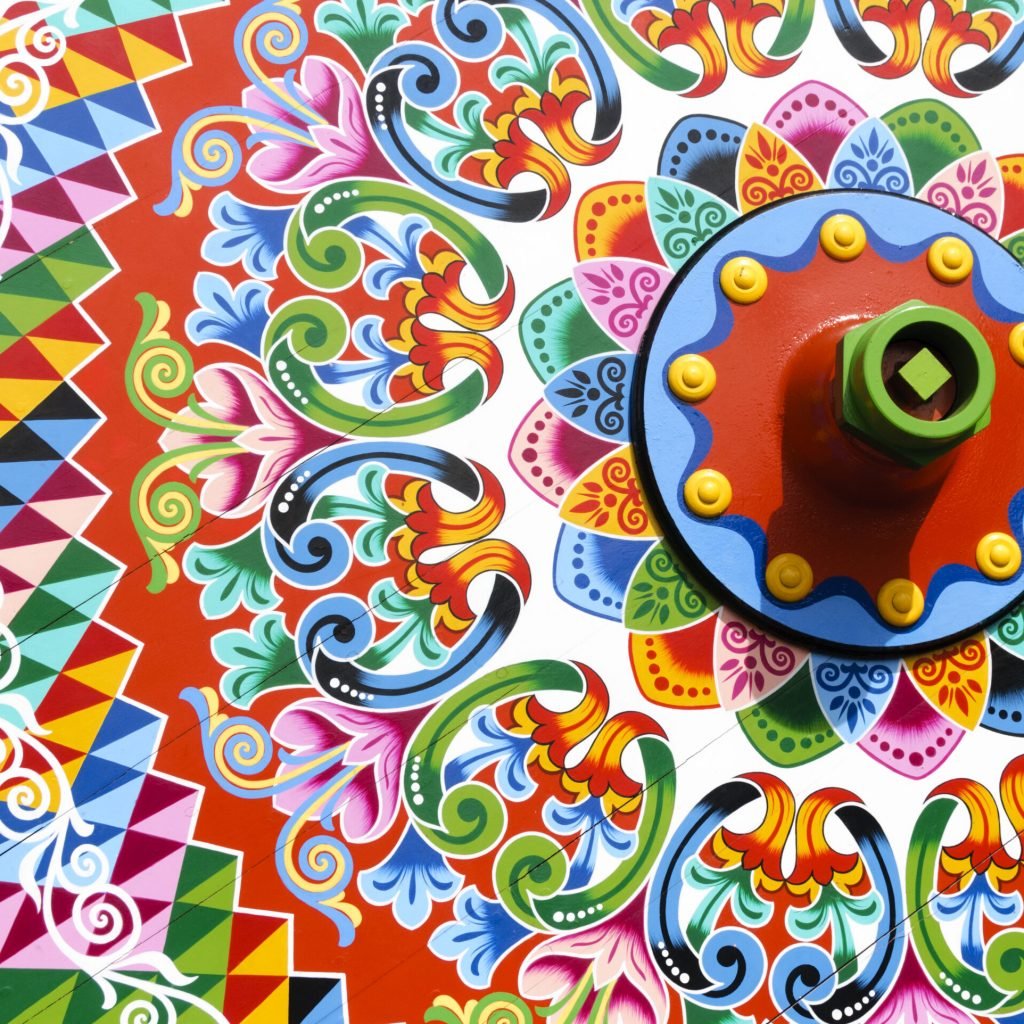 traditionally painted ox cart wheel